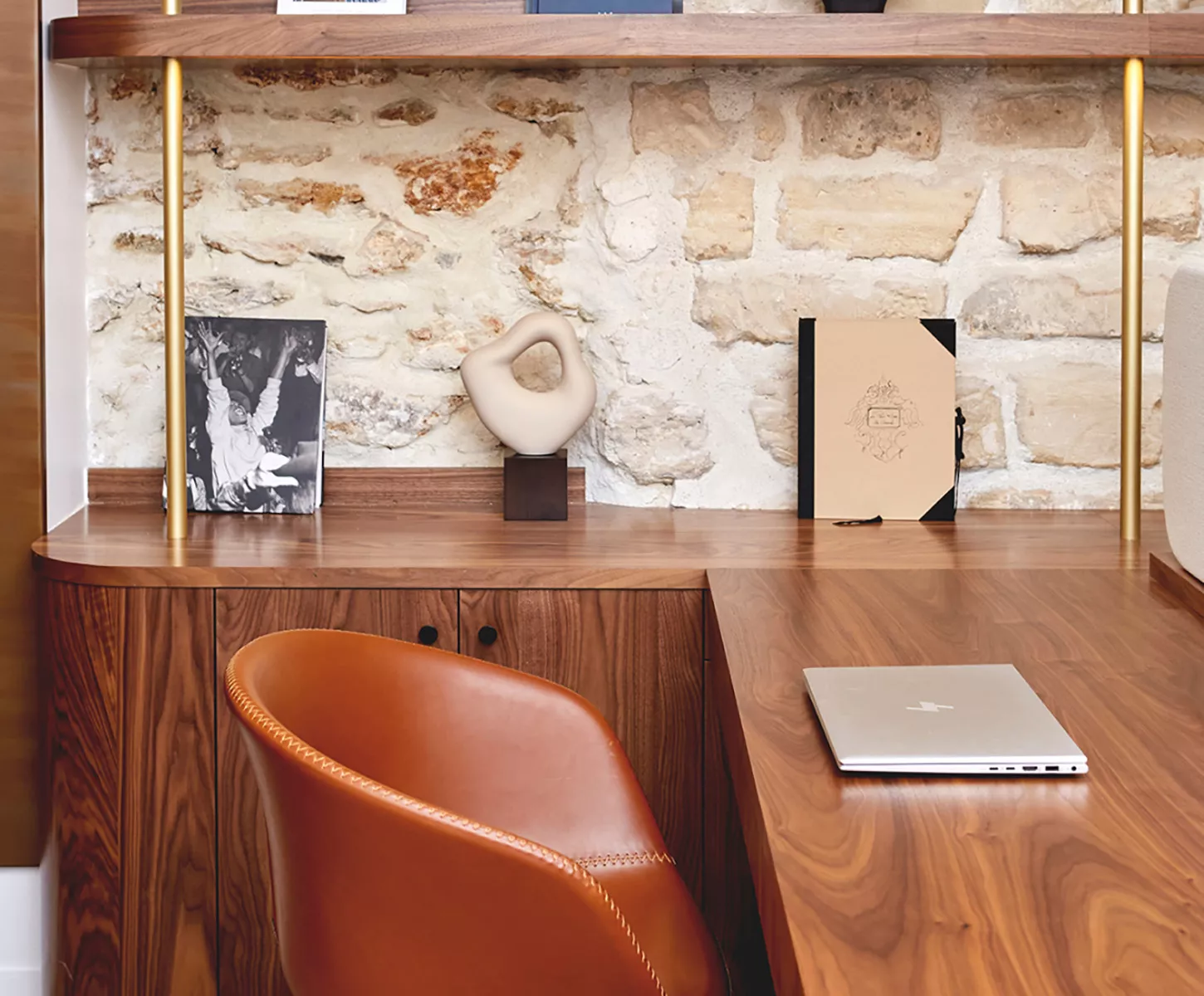 Interior of a luxury Junot estate agency, view of a brown chair and desk