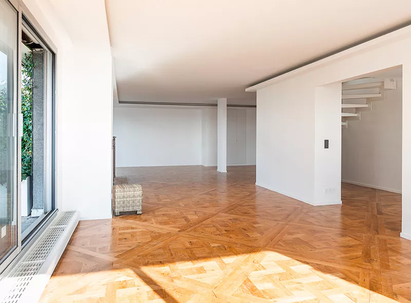 Empty luxury apartment before home staging by Junot